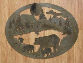 [SABC01B-1] SABC01-1 Steel Wall Art, Oval Laser Cut Metal Wall Art Crafted with Steel, Unique Color Burn and Clear Powder Coated of a Bear in the Woods next to a Cabin.